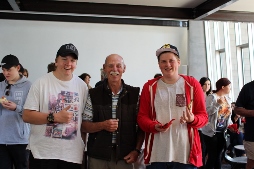Two male students with older male mentor